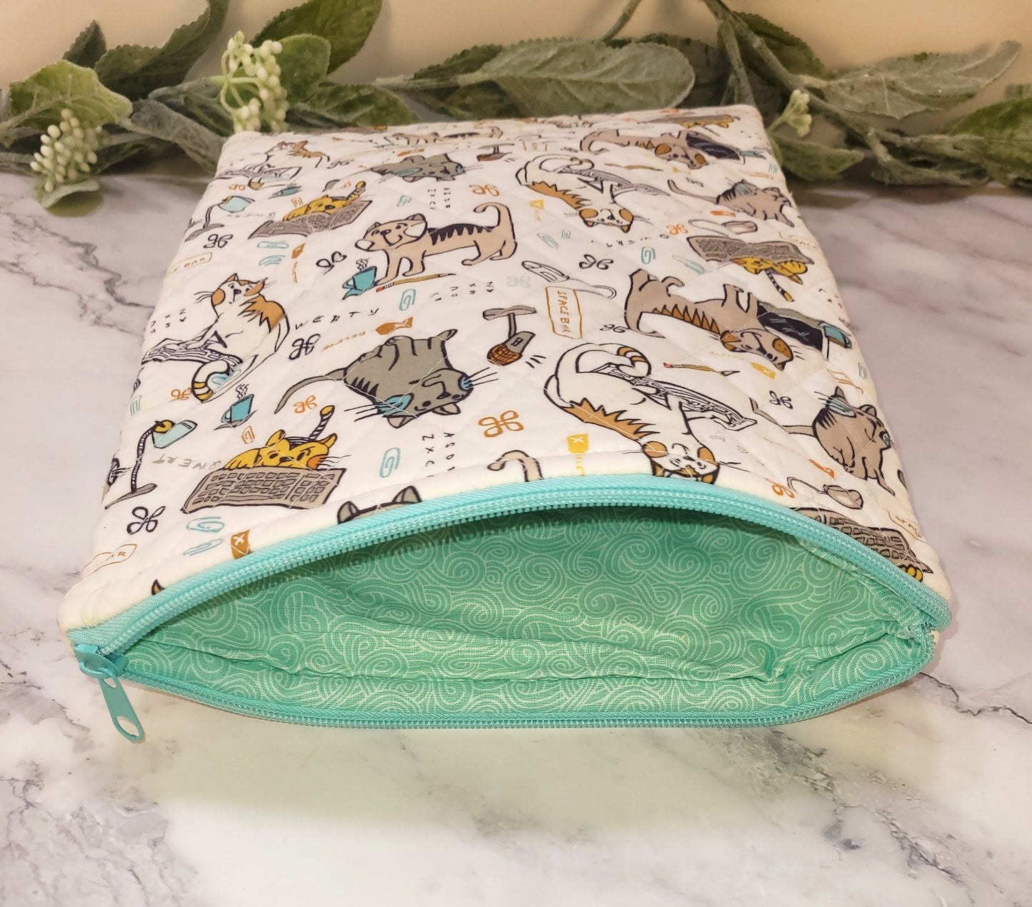 Kitty Kitty Quilted protective sleeve. size M