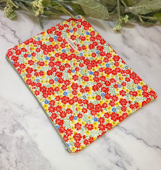 Primary Petals quilted protective sleeve. size M