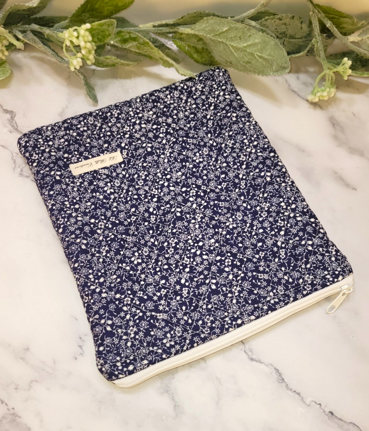 Blue Calico quilted protective sleeve. size S