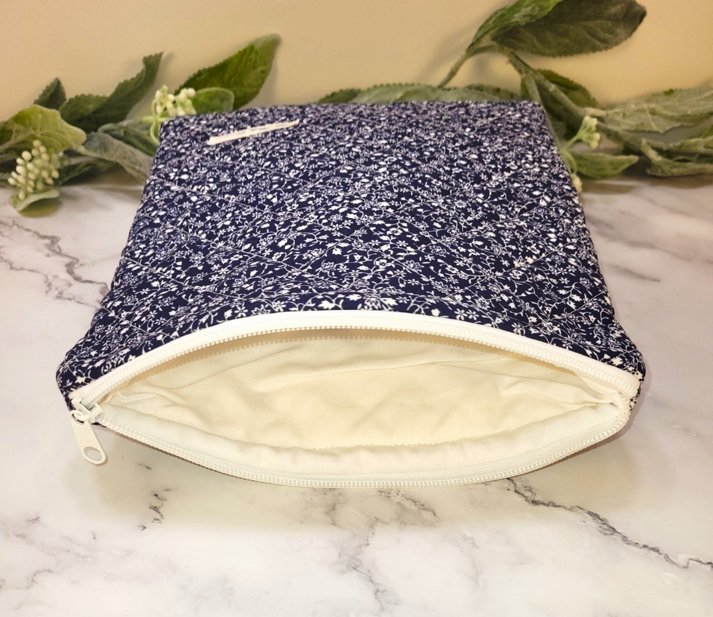 Blue Calico quilted protective sleeve. size S