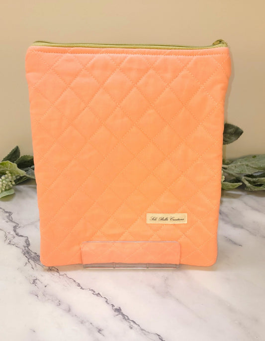 Peachy quilted protective sleeve. size S