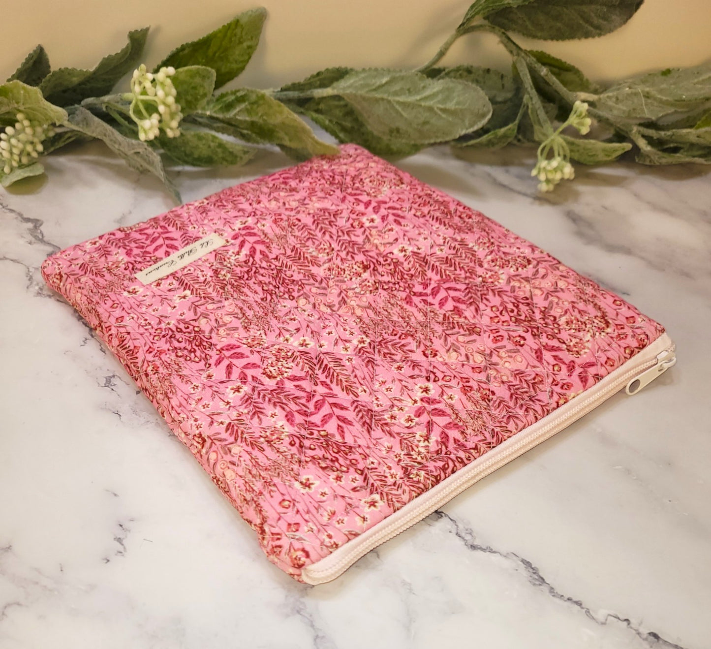Pink Flower Fields quilted protective sleeve. size S