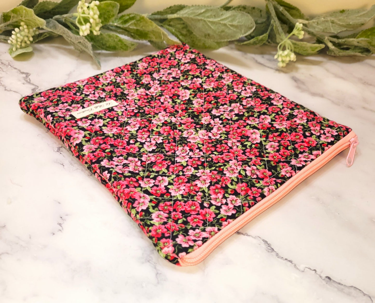 Pink Pansies quilted protective sleeve. size S