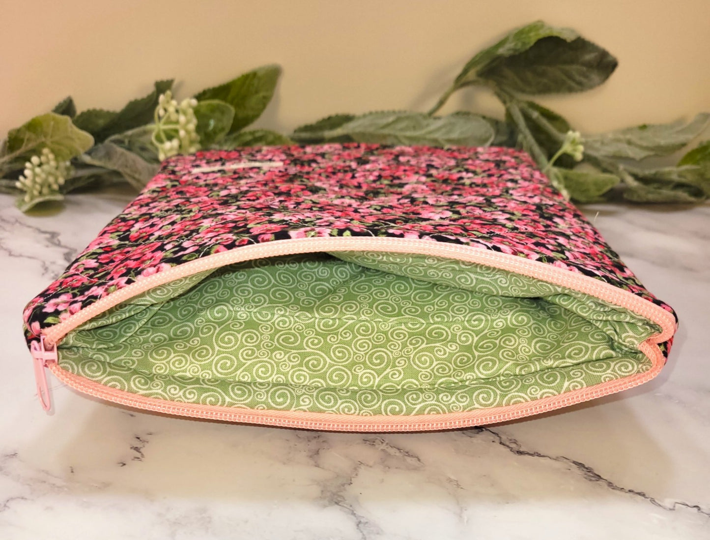 Pink Pansies quilted protective sleeve. size S