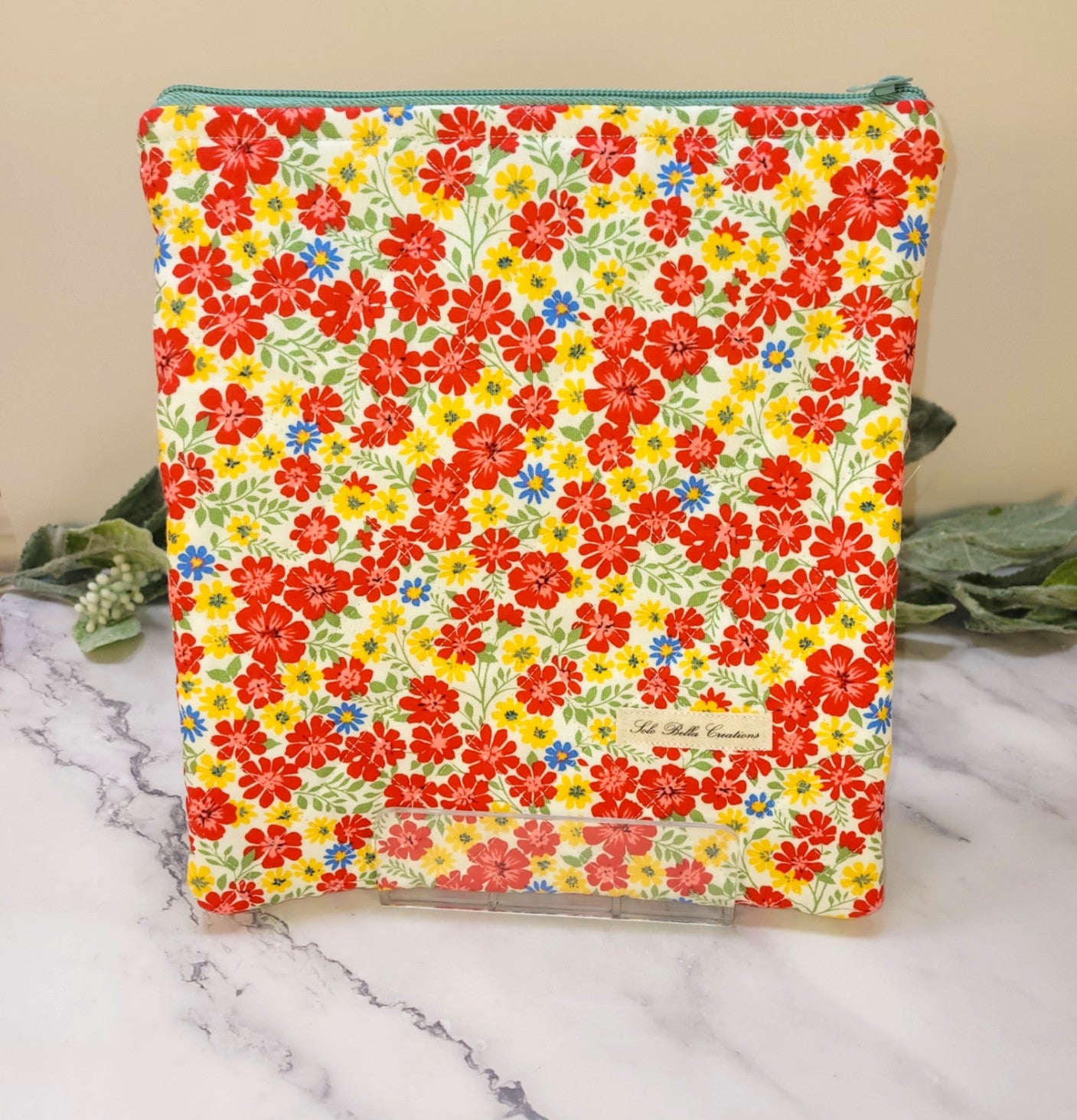 Primary Petals quilted protective sleeve. size S