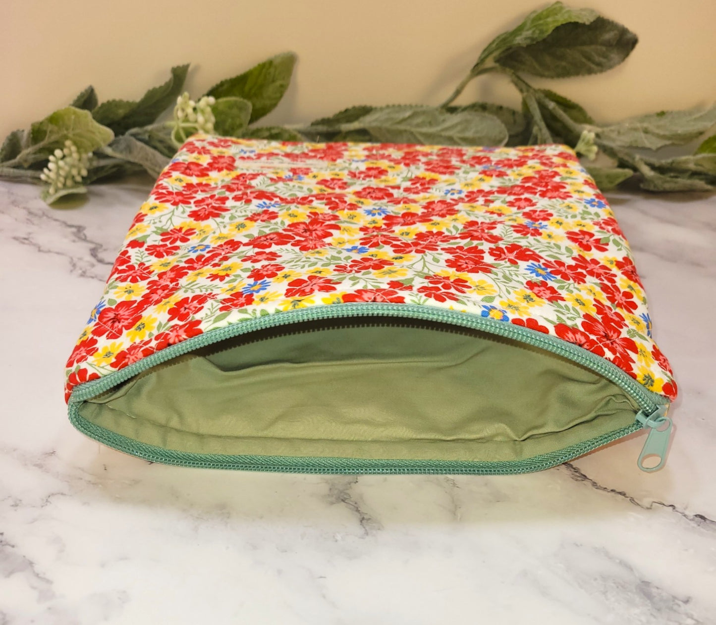 Primary Petals quilted protective sleeve. size S